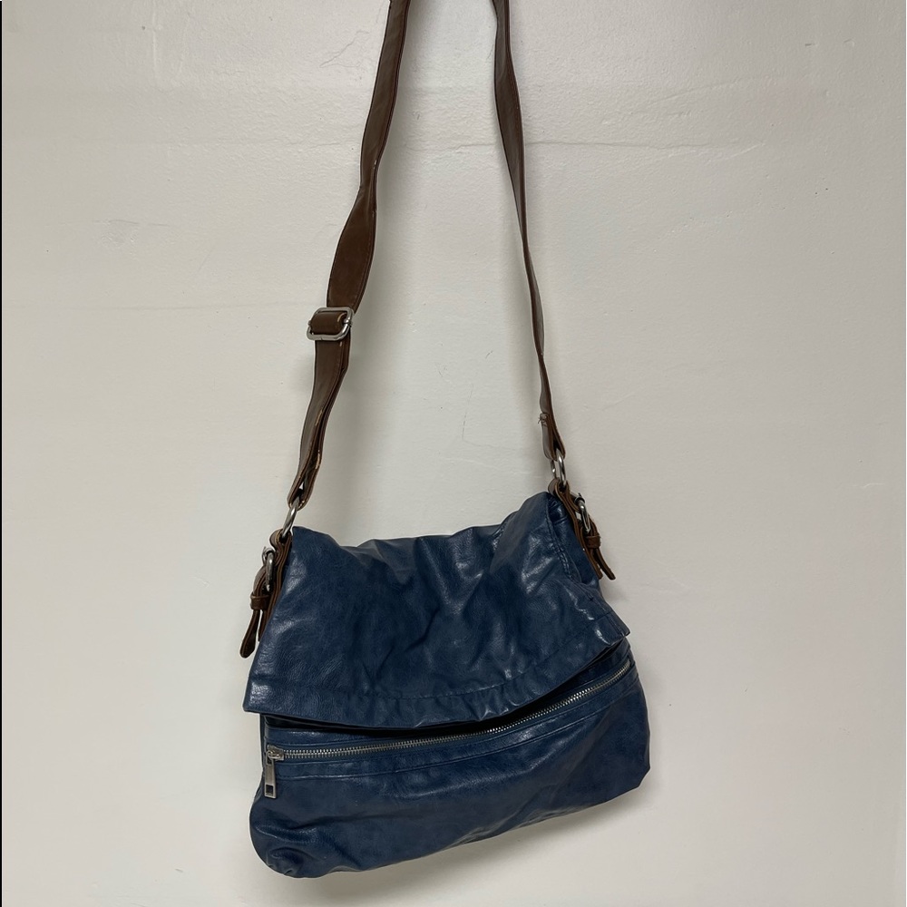 Blue leather crossbody handbag gently used